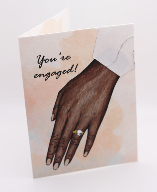 You're engaged! dark female hand