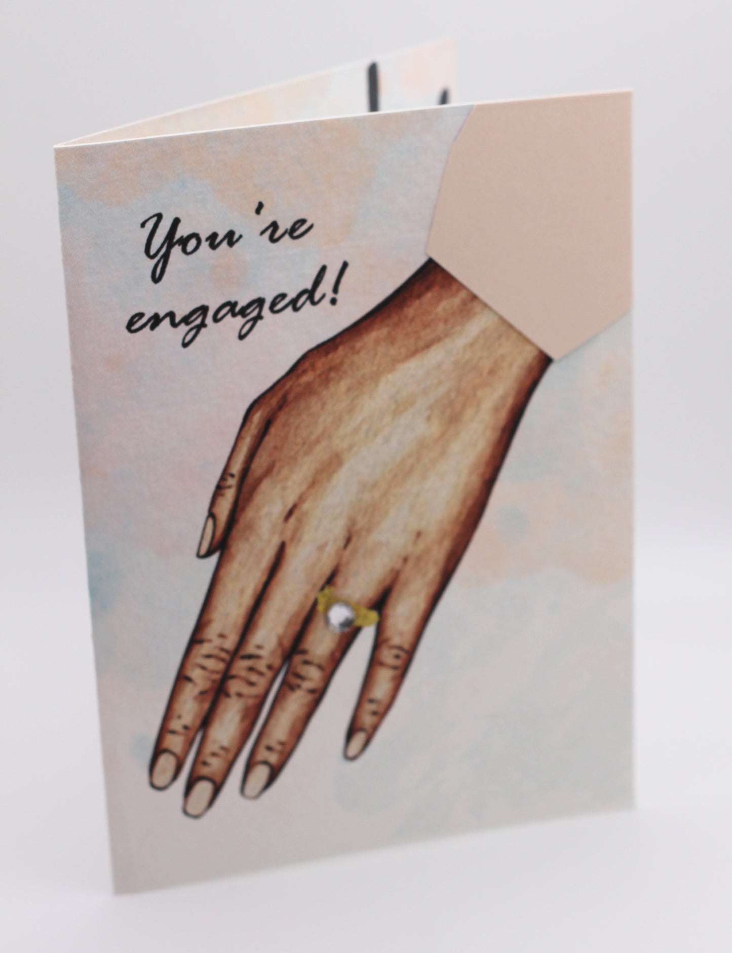 You're engaged! medium-tone female hand